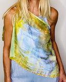 Almost Scarf by Shelly Lawler with signature pre-tied design, lightweight fabric draped across the body showing full green and yellow pattern