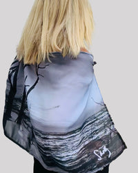 Back view of Beach Scarf with signature pre-tied design, highlighting fluid drape, lightweight fabric flow, and logo detail