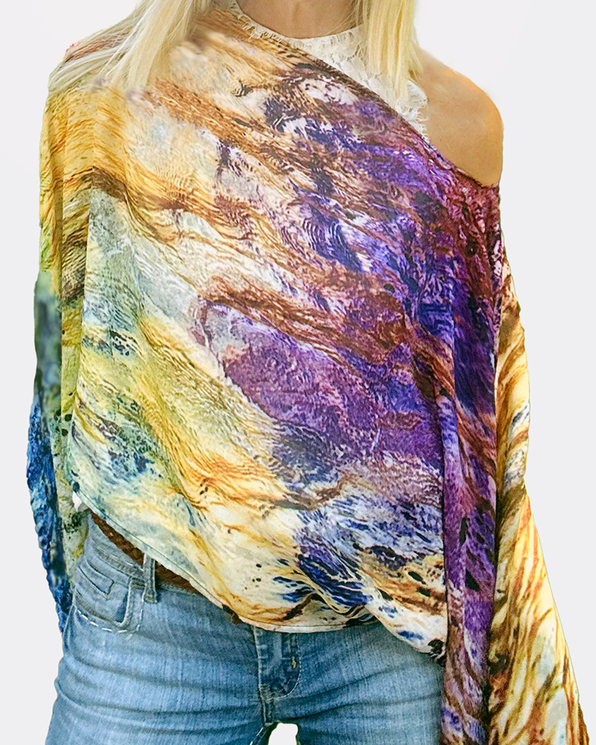 Flow Poncho closeup worn off shoulder, purple golden tone pattern, lightweight flowing fabric