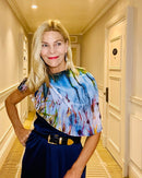 Light Years Ahead Scarf with signature pre-tied design, styled to show abstract artwork in soft blue and white tones