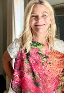 Shelly Lawler demonstrating how to style the Fall Color Scarf, showing lightweight fabric elegant drape