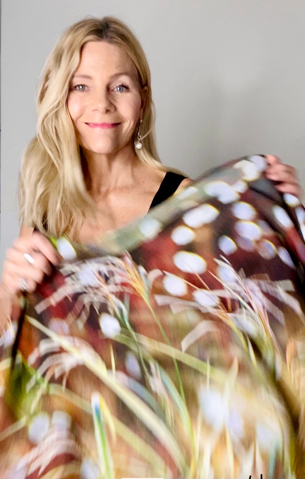 parkle Poncho wearing demonstration showing earth tone shimmer design, slip-over styling and flowing fabric movement