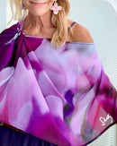 Royal Scarf close-up highlighting signature pre-tied design and abstract purple floral artwork on lightweight fabric.