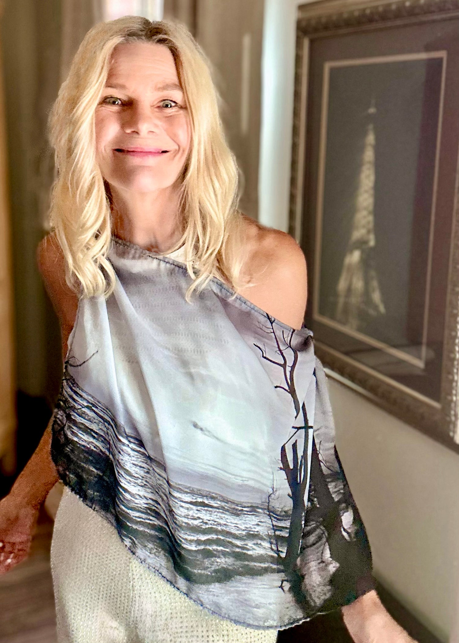 Beach Scarf with signature pre-tied design, worn off one shoulder showing natural drape and lightweight fabric movement in black-and-white coastal print