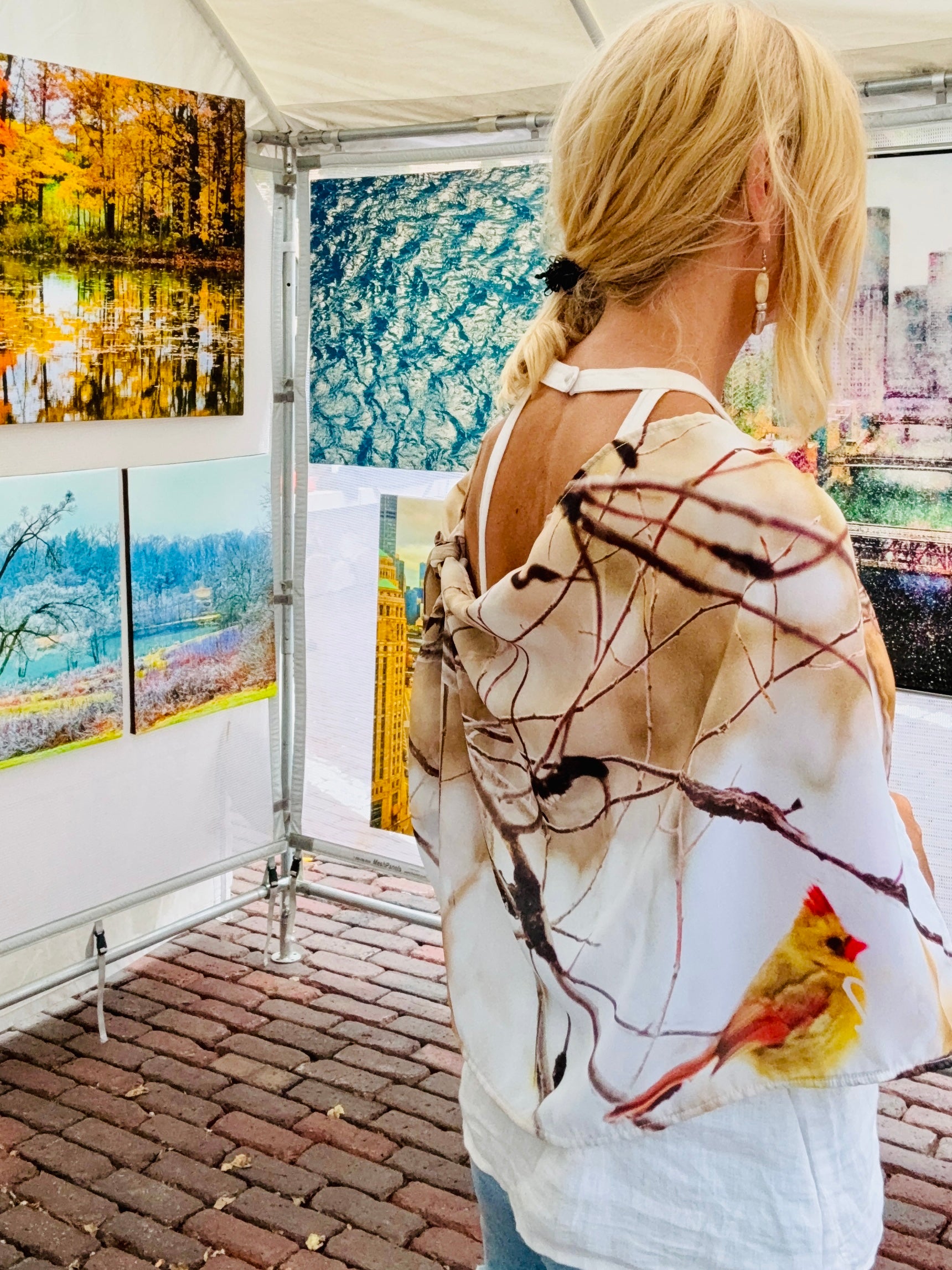 Back view of cardinals print lightweight scarf with signature pre-tied design, showing female cardinal artwork with fluid drape and fabric flow