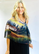 Tuscany Scarf worn off one shoulder, showcasing Italian landscape artwork with soft, lightweight fabric